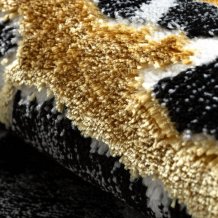 Kusový koberec Allure 1963 black/gold