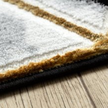 Kusový koberec Allure 1966 black/gold