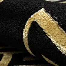 Kusový koberec Allure 1968 black/gold